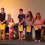 Contributed photo/Friday Harbor Grange No. 225                                Pictured left to right: Dorian Oliver, master of ceremonies; Nancy Fusure, Grange program director; contestants Dexter Prescott, Eric Sable, Sienna Bartlett, Blake Budwill, Austyn Gunwall, Emily Atwell, Aida Must, Adriena Pew, Dominic Beachem, and Maria Penwell with her son Carson. Not pictured, Deborah Strasser