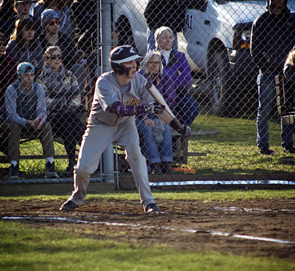 Photo/Greg Sellentin - With bases loaded in the third inning, Corbin Williams attempts a bunt