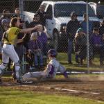 Photo/Greg Sellentin - Eli Cooper-West slides into home base to score in the fourth inning