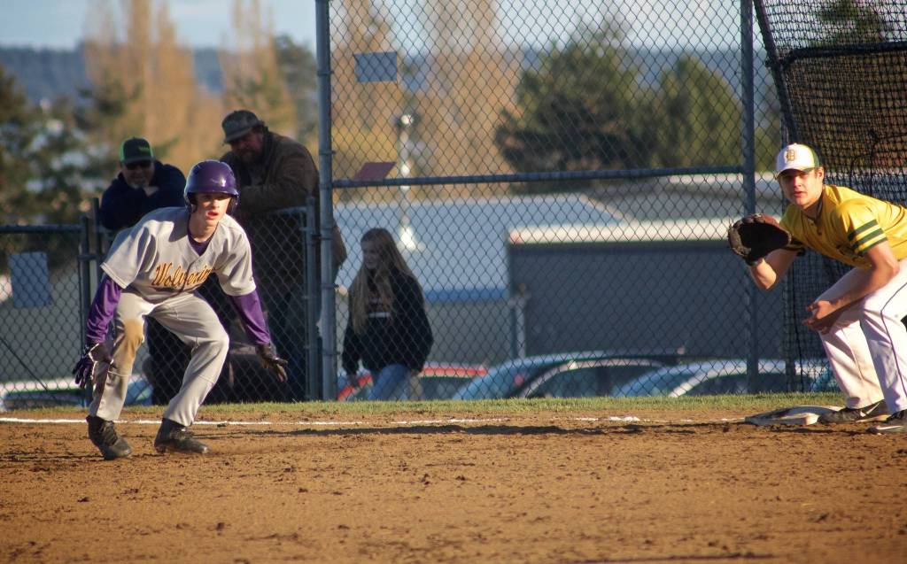 Photo/Greg Sellentin - Ethan Germain leads off of first base, looking to steal second