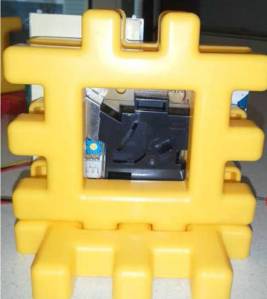 Sensor kit components assembled using a children&rsquo;s building toy pieces and velcro.