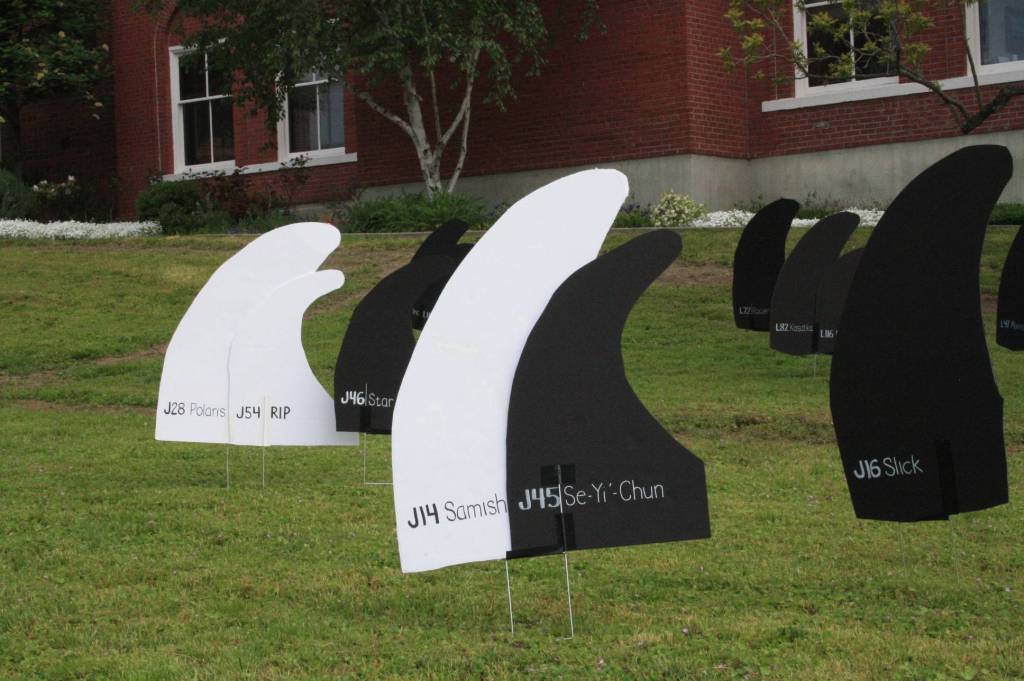 Staff photo/Hayley Day                                White orca fins represented ghosts of those who died in 2016 and early 2017.