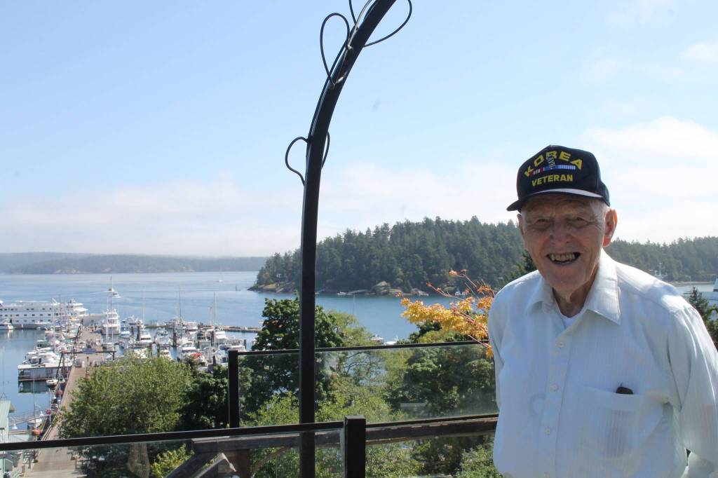 Staff photo/Hayley Day                                Frank Hastings relaxes at the American Legion before the parade. Hastings was in the Navy during the Korean War.