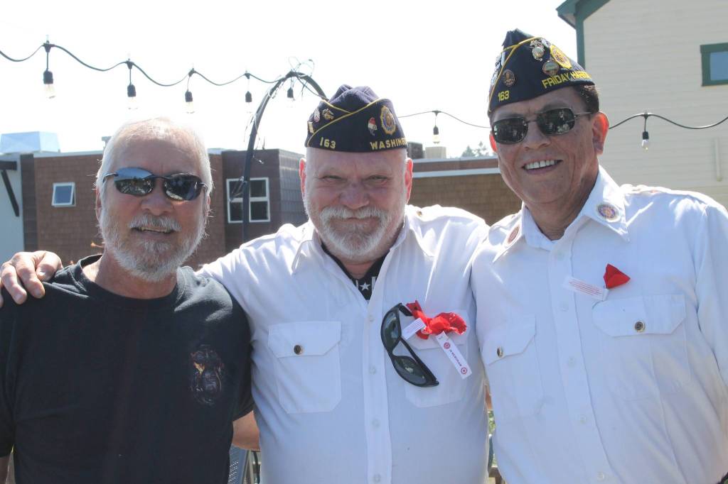 Staff photo/Hayley Day                                Marine Corps veterans reminisce at the American Legion before the Memorial Day event.