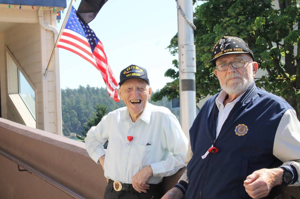Staff photo/Hayley Day                                Veterans gather outside the American Legion before the Memorial Day parade.