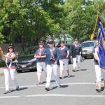 Staff photo/Hayley Day                                The American Legion Auxillary, a women&rsquo;s patriotic service organization, marches in the Memorial Day parade.