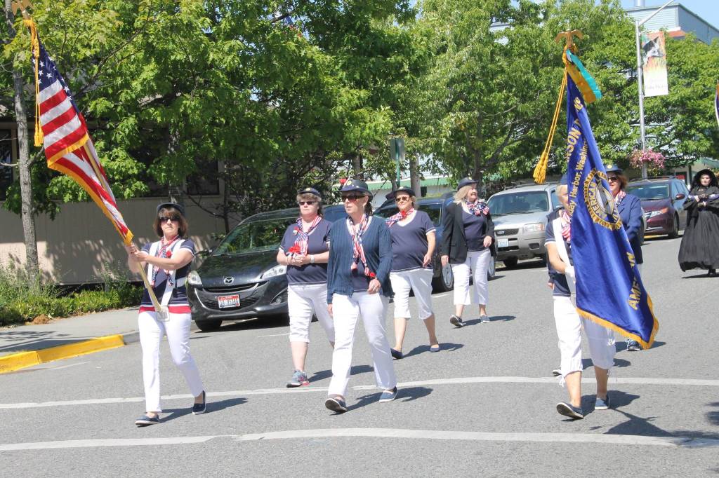 Staff photo/Hayley Day                                The American Legion Auxillary, a women&rsquo;s patriotic service organization, marches in the Memorial Day parade.
