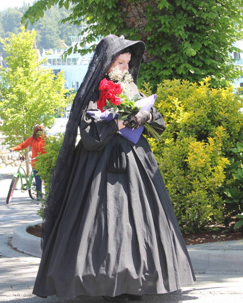 Staff photo/Hayley Day                                Lynda Guernsey dresses in black, each year, to represent widows of fallen soldiers.
