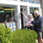 Staff photo/Hayley Day                                A couple browses options at a Friday Harbor vacation rental business.