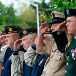 Staff photo                                Veterans salute during the 2014 Memorial Day parade in Friday Harbor.