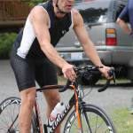 Staff photo. Biker heads to the finish line, only to prep for the run.