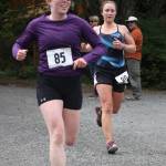 Staff photo. Runners happily approaching finish line.