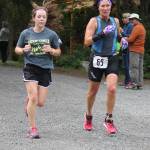 Staff photo. Runners approach the finish line.