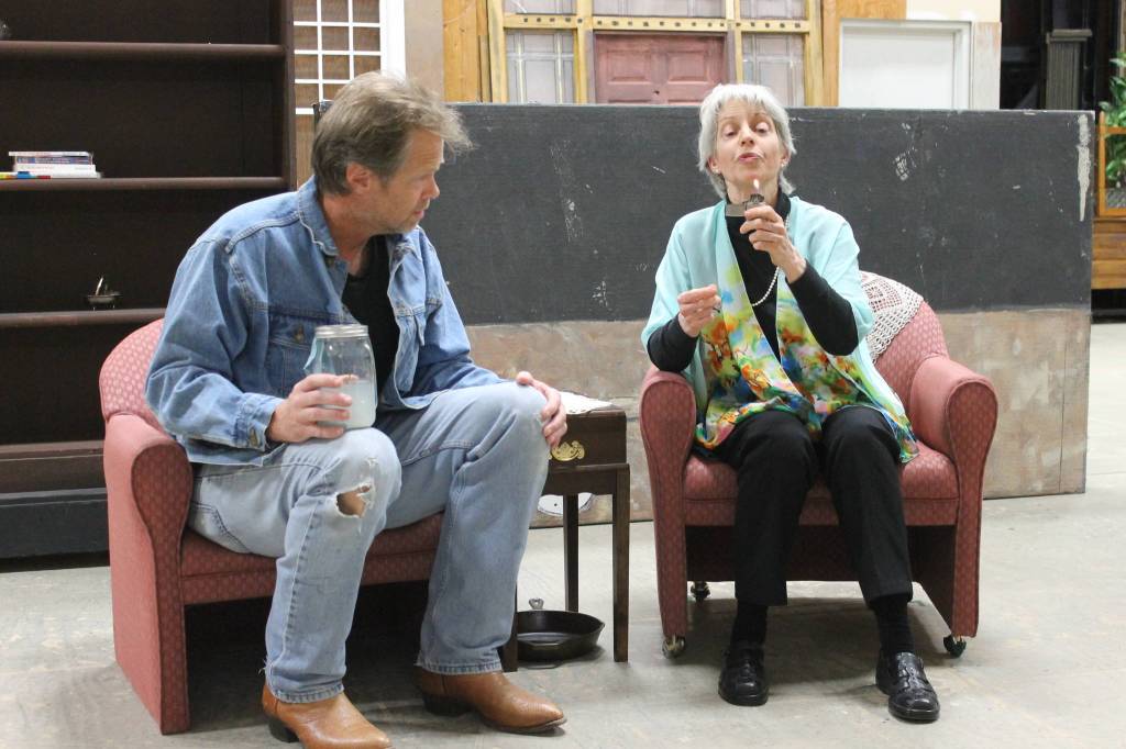 Staff photo/ Heather Spaulding. Brad Fincher and Deb Langhans rehearse as Chris and Alexandra in &ldquo;Velocity of Autumn.&rdquo;