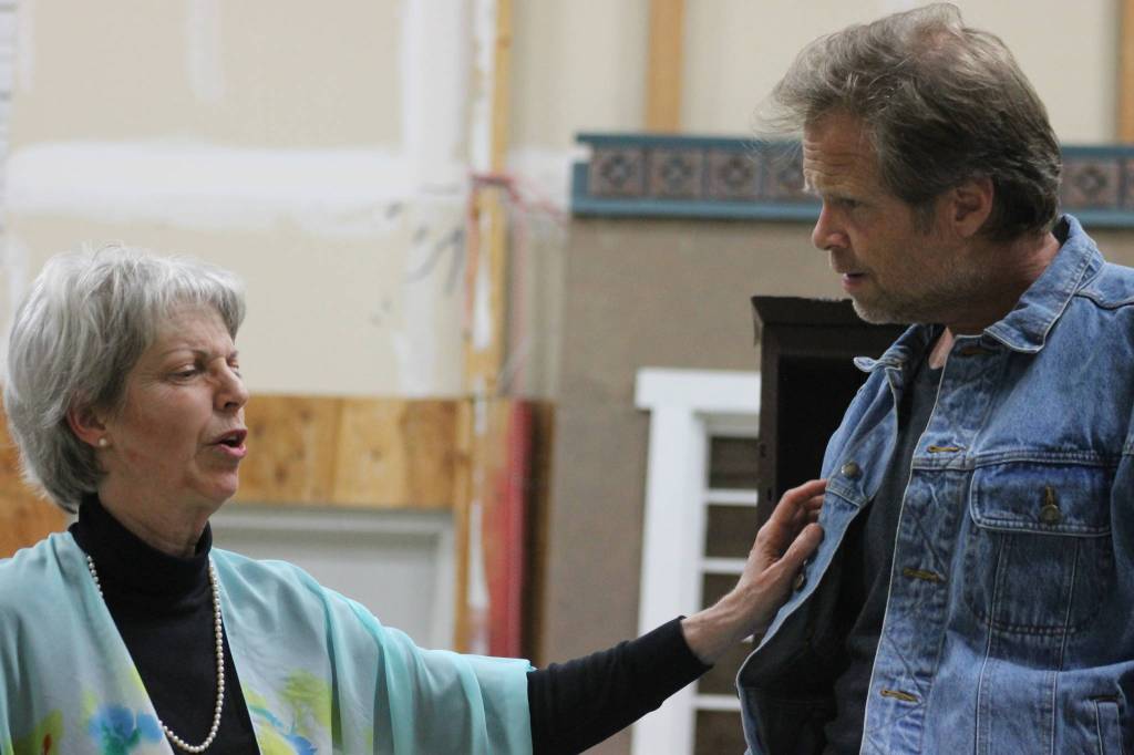 Staff photo/ Heather Spaulding. Brad Fincher and Deb Langhans rehearse as Chris and Alexandra in &ldquo;Velocity of Autumn.&rdquo;