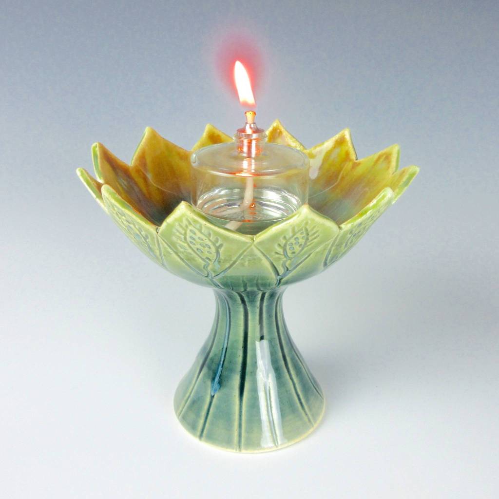 Photo Contributed by the Artist Studio Tour. Kat Rose clay and porcelain candle holder.