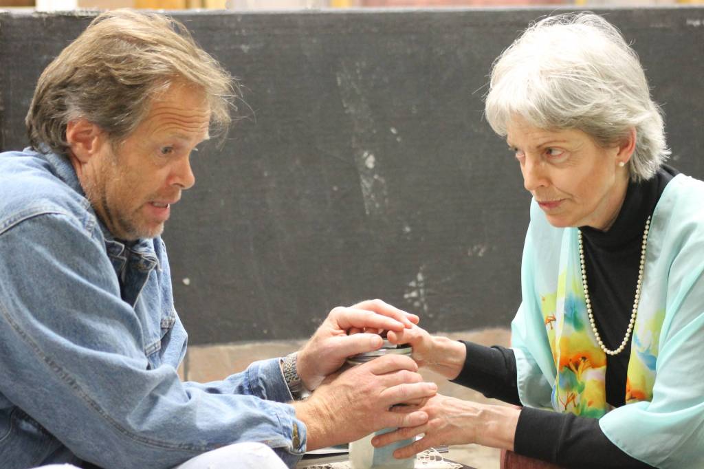 Staff photo/ Heather Spaulding. Brad Fincher and Deb Langhans rehearse as Chris and Alexandra in &ldquo;Velocity of Autumn.&rdquo;