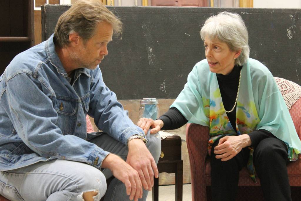 Staff photo/ Heather Spaulding. Brad Fincher and Deb Langhans rehearse as Chris and Alexandra in &ldquo;Velocity of Autumn.&rdquo;