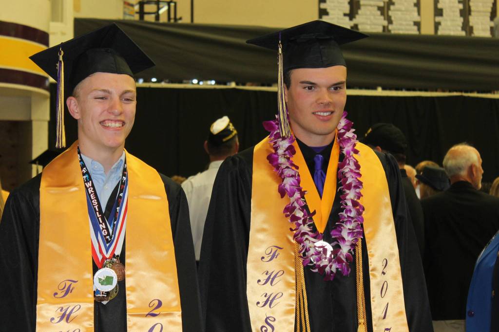 Staff photo/Heather Spaulding                                Graduates walk toward the podium.
