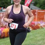 Staff photo. After finishing up biking, triathalon competer begins the running segment of the race