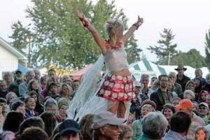 Staff photo                                An attendee displays her work at the Trashion Fashion show in 2012.