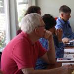 Staff photo/Hayley Day                                San Juan Island School District Board members and staff review the budget at a meeting on July 14.