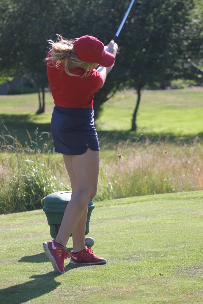 Staff photo/Heather Spaulding.                                Kendra Meeker takes a swing.