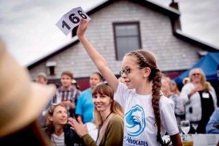 Contributed photo/Amber Chenoweth Photography                                A young girl is excited to join the live auction.