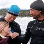 Contributed photo/ Kyle Carver                                Karl Kruger with wife Jessica and daughter Dagney at the end of the Race to Alaska.