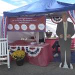 Protesters at the Republican booth at the San Juan County Fair