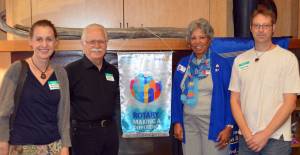 Contributed photo by Jack Cory                                Left to right: Jennifer Armstrong of the San Juan Island Family Resource Center, John Lackey of Hospice San Juan, Rotary Dist. Gov. Lindagene Coyle, Brian Moore of the San Juan Island Family Resource Center.