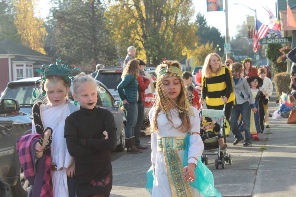 Staff photo/Heather Spaulding                                Friday Harbor Elementary School students parade their costumes down Argyle Avenue on Halloween.