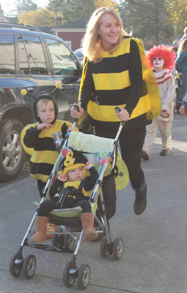 Staff photo/Heather Spaulding                                Friday Harbor Elementary School students parade their costumes down Argyle Avenue on Halloween.