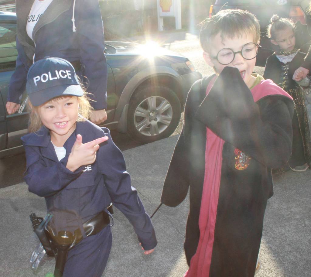 Staff photo/Heather Spaulding                                Friday Harbor Elementary School students parade their costumes down Argyle Avenue on Halloween.