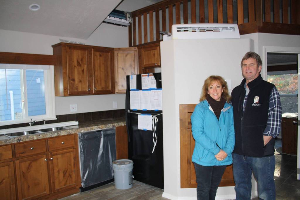 Staff photo/Hayley Day                                Anna Maria de Freitas and David Pass stand in the kitchen of a tiny house they will rent out in Friday Harbor. Each unit includes a full-size kitchen.