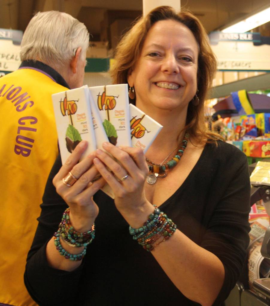 Staff photo/Hayley Day                                Shahn McGuire shows off her the only items she kept  four mint chocolate bars  from her four-minute run. The rest she donated to the Friday Harbor Food Bank.