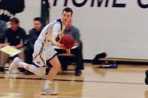 Wolverines boys’ basketball earns second season win