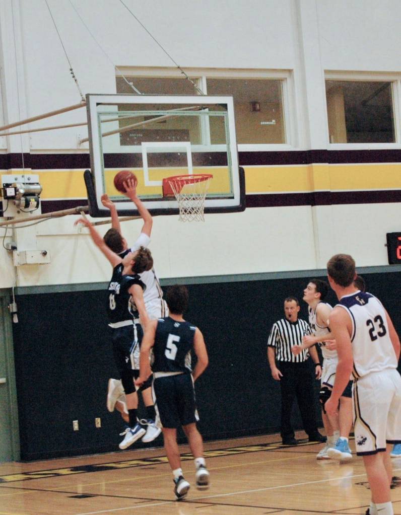 Contributed photo/John Stimpson                                Marshall Clark jumps high for a score.