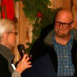 Staff photo/Heather Spaulding                                Mayor Carrie Lacher reading a proclamation about appreciating ferry workers to ZacAkin.                                Staff photo Heather Spaulding. Mayor Carrie Lacher presents award to Zac Akin and the Friday Harbor ferry crew.
