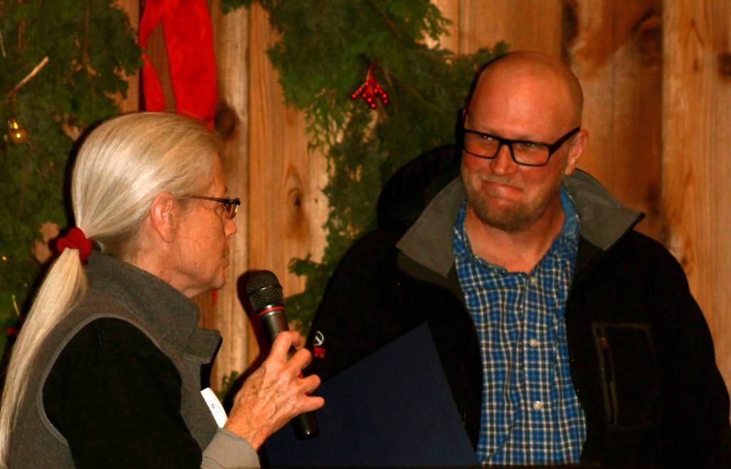 Staff photo/Heather Spaulding                                Mayor Carrie Lacher reading a proclamation about appreciating ferry workers to ZacAkin.                                Staff photo Heather Spaulding. Mayor Carrie Lacher presents award to Zac Akin and the Friday Harbor ferry crew.