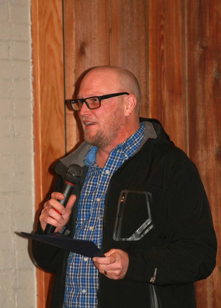 Staff photo Heather Spaulding. Mayor Carrie Lacher presents award to Zac Akin and the Friday Harbor ferry crew.