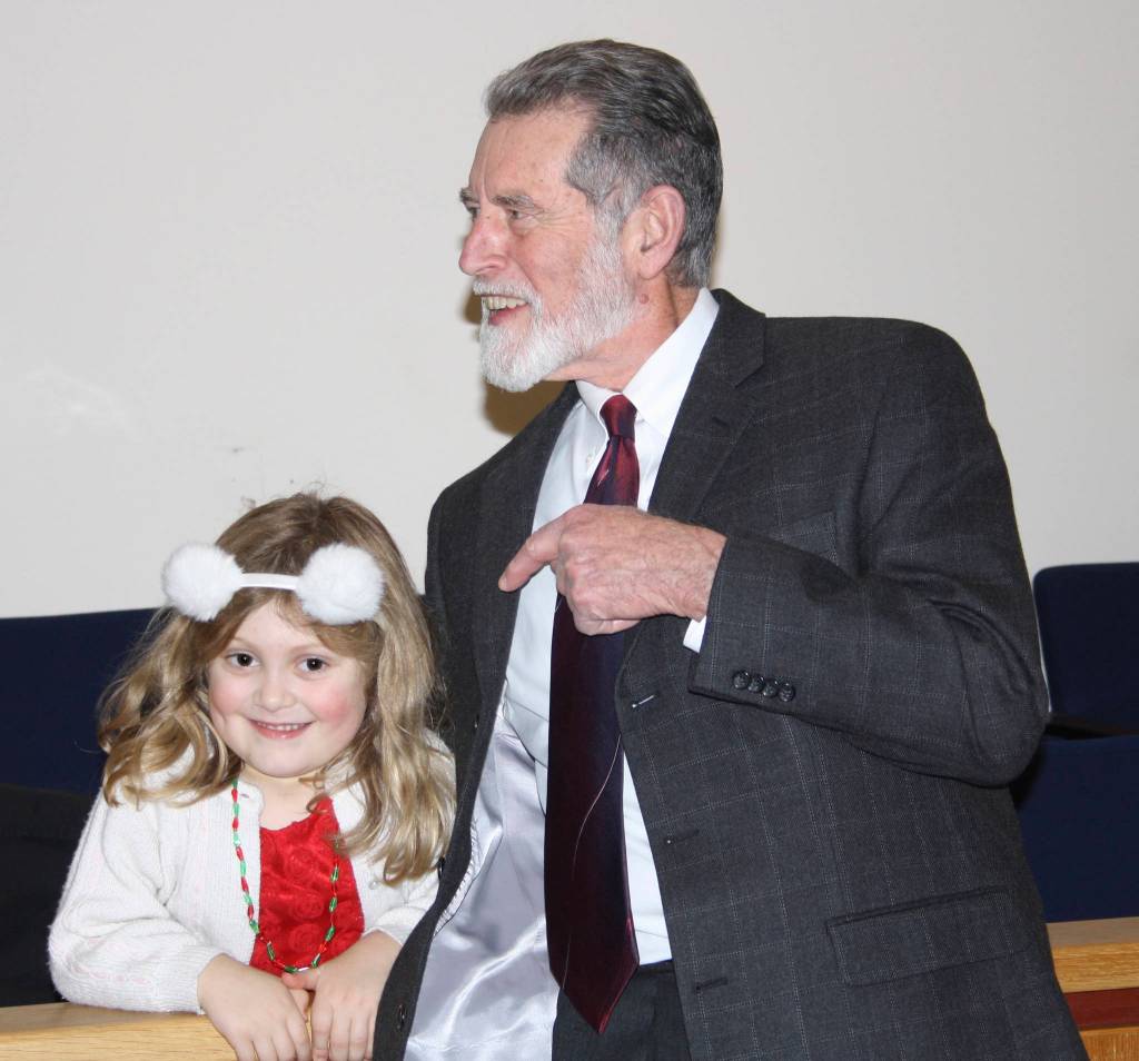 Staff photo/Hayley Day                                Avaline Anderson, the daughter of San Juan County Juvenile Court Administrator Linnea Anderson, congratulates the retiring judge.
