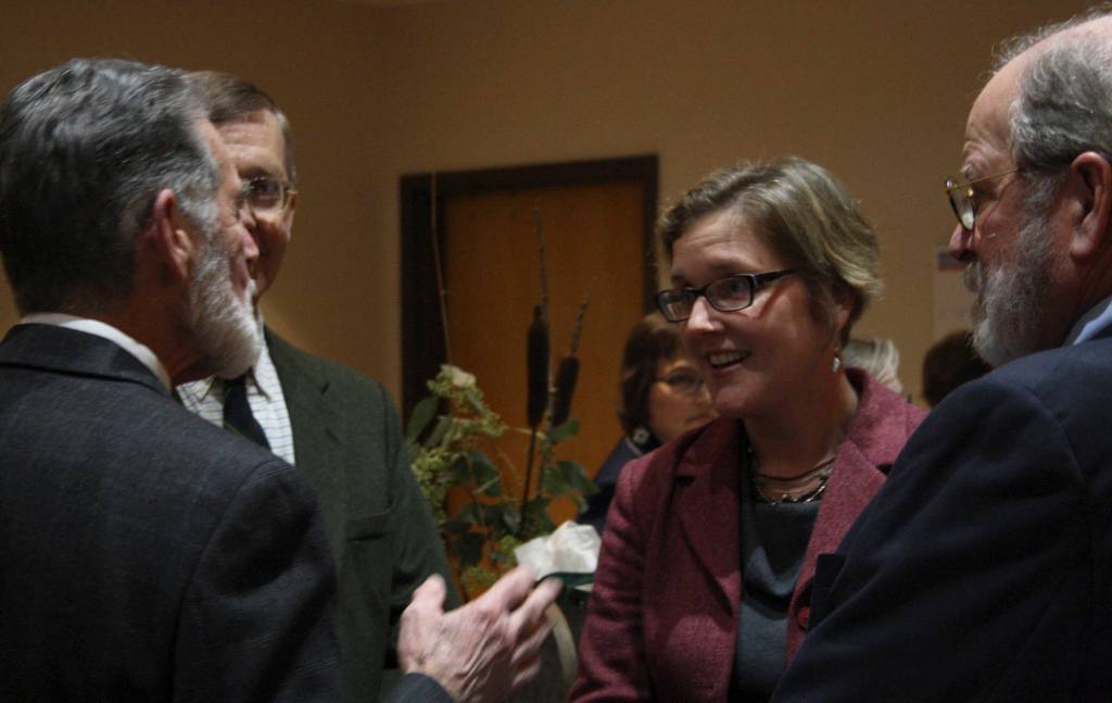 Staff photo/Hayley Day                                Katie Loring, who will replace Donald Eaton as San Juan County Superior Court Judge, talks with the retiree.