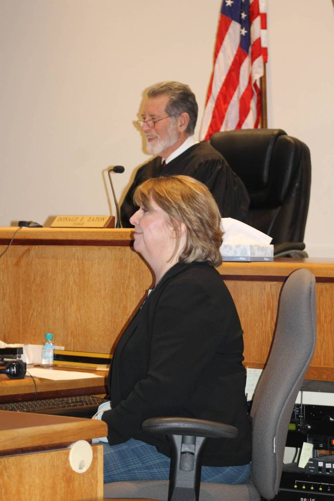 Staff photo/Heather Spaulding The last San Juan Superior Court Judge Donald Eaton and court clerk watch as Katie Loring is sworn in.