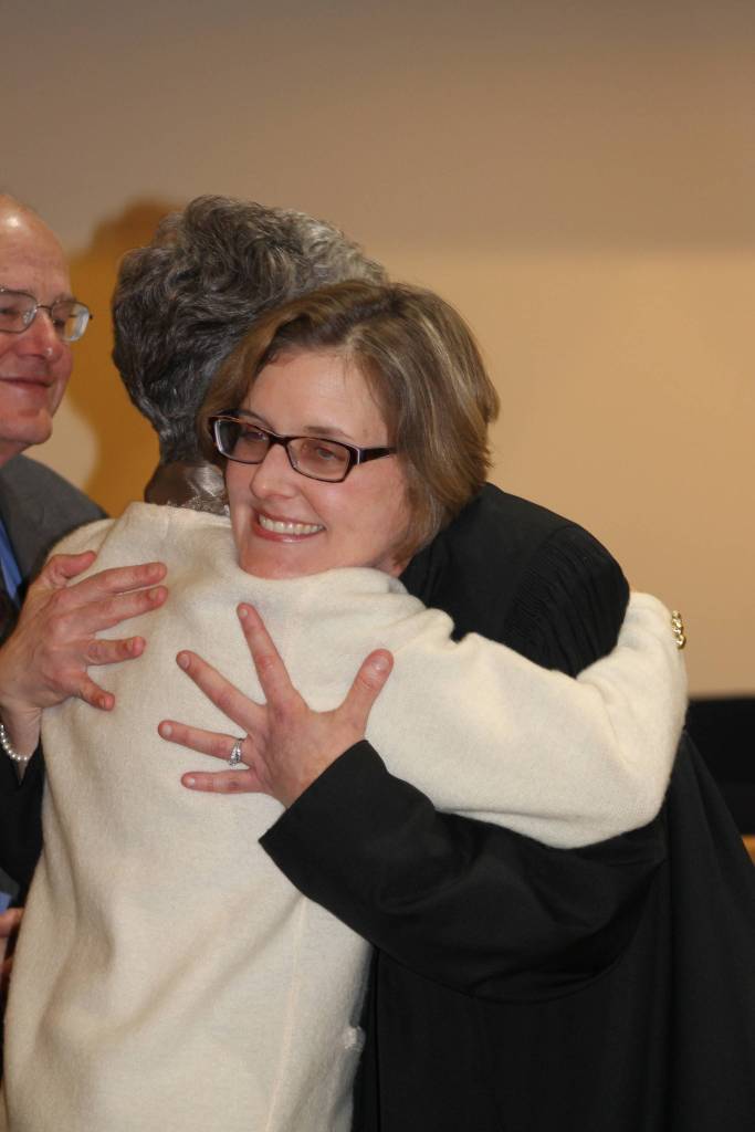 Staff photo/Heather Spaulding San Juan Superior Court Judge Katie Loring hugs her mother.