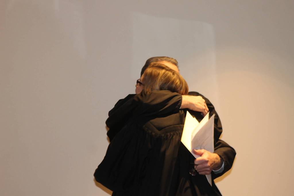 Staff photo/Heather Spaulding                                 San Juan Superior Court Judge Katie Loring is congratulated by retiring Judge Donald Eaton.