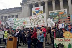 Salish Sea activists occupy the front steps of the state capitol