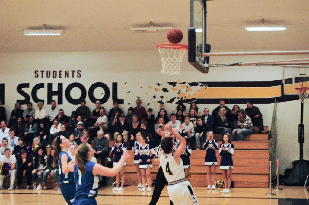 Contributed photo/John Stimpson                                Ava Hoffman drives in for a 2-point layup.