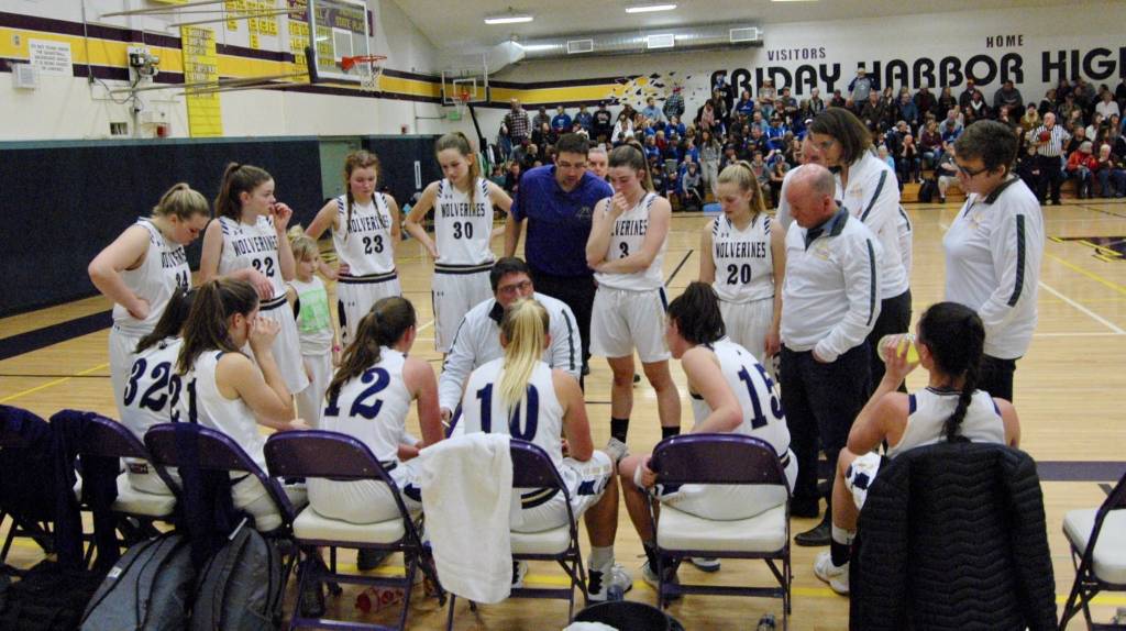 Contributed photo/John Stimpson                                Coach Fred Woods formulates a winning strategy.