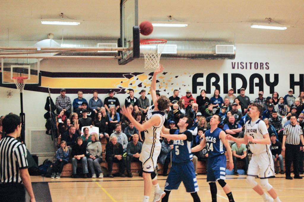 Contributed photo/John Stimpson                                Isaac Mayer drives for a 2-point layup.